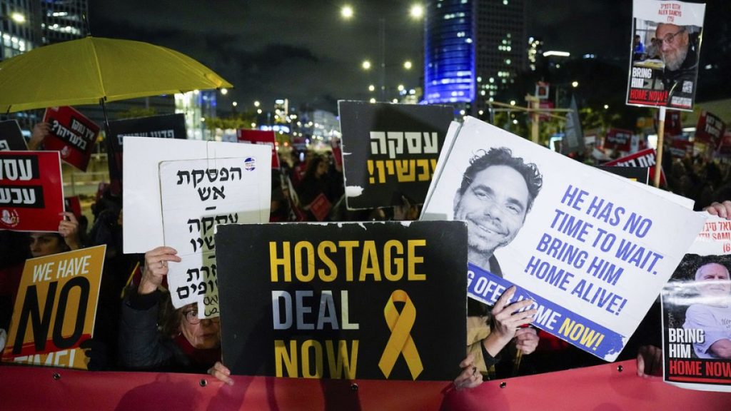 FILE: Israeli protesters demand the immediate release of the hostages held in the Gaza Strip by the Hamas militant group at a protest in Tel Aviv, 1 February 2024