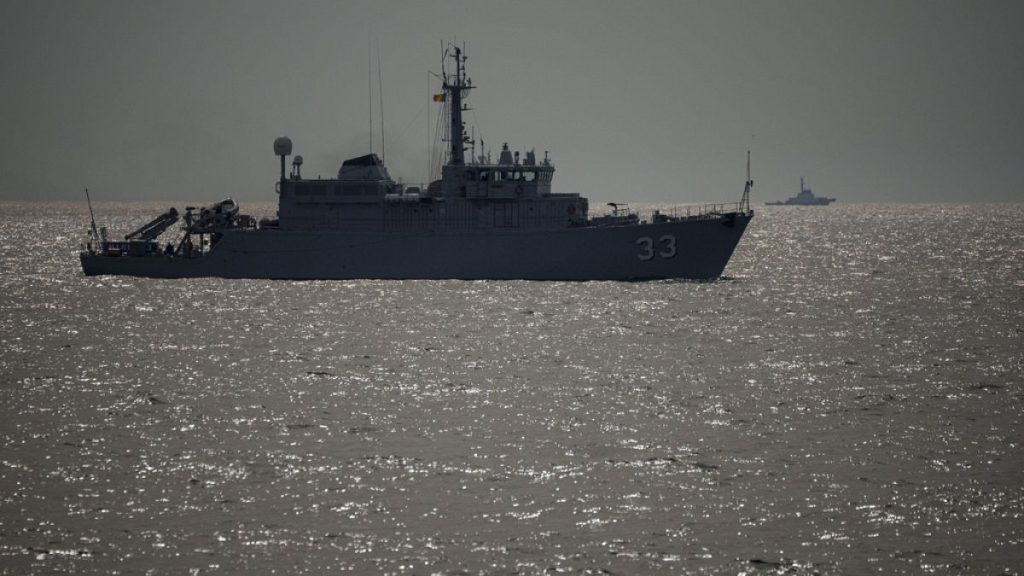 A warship sails during a Romanian Navy led exercise outside Constanta, Romania, Tuesday, April 16, 2024. The exercise, dubbed