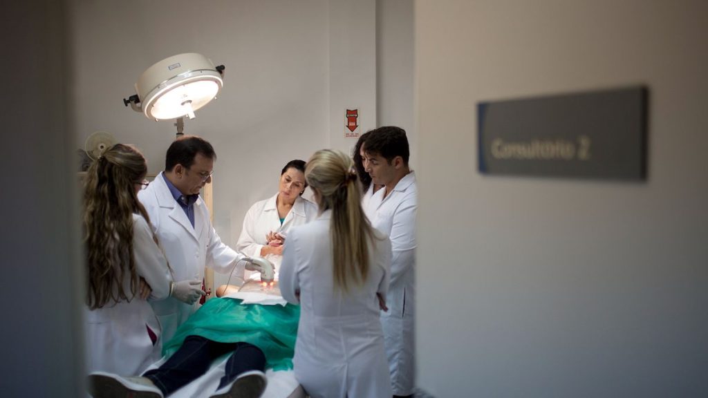 A patient receives a radio-frequency treatment on her abdomen in Brazil.