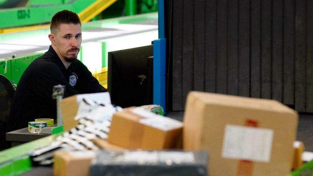 U.S. Customs and Border Protection technician Czar Zeman monitors overseas parcels at Chicago