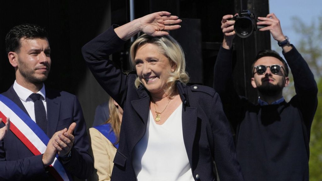 French far-right leader Marine Le Pen arrives as she attends at the French far-right party national rally near the parliament in Paris, Sunday, April 6, 2025.