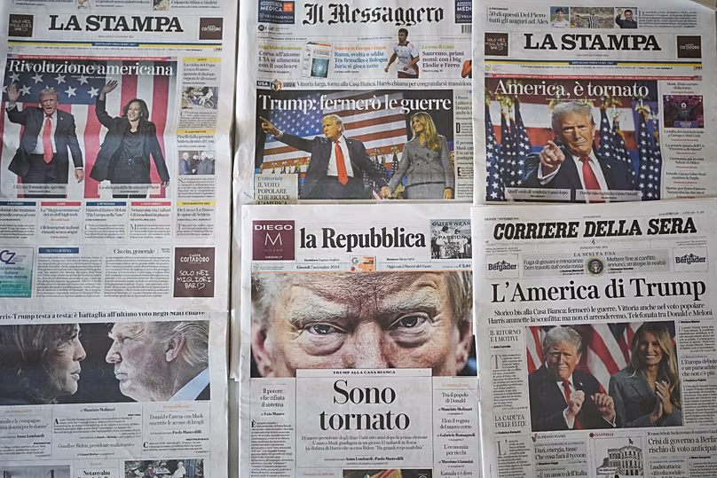 A view of the front pages of Italian newspapers reporting on Donald Trump's win in the US presidential election in Rome, 7 November, 2024