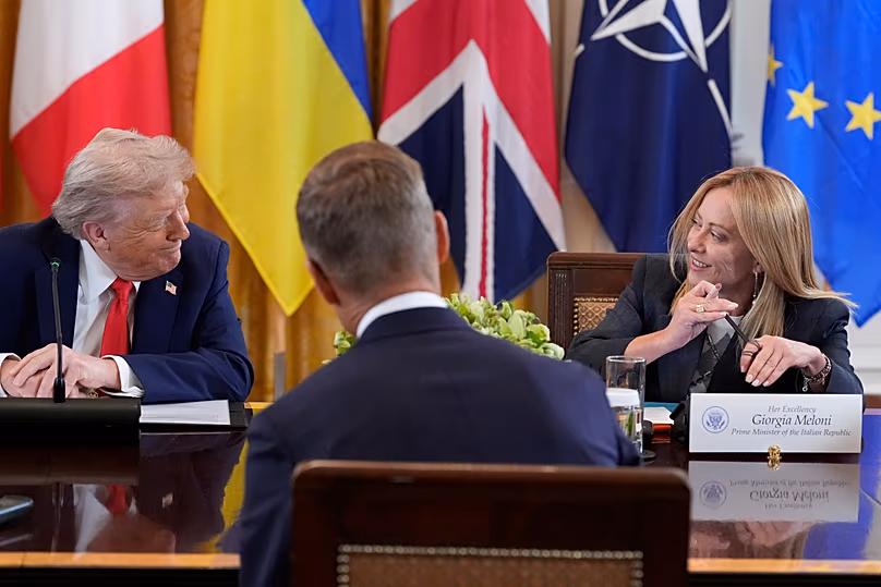 Le président américain Donald Trump et la Première ministre italienne Giorgia Meloni dans la salle Est de la Maison Blanche, le 18 août 2025.