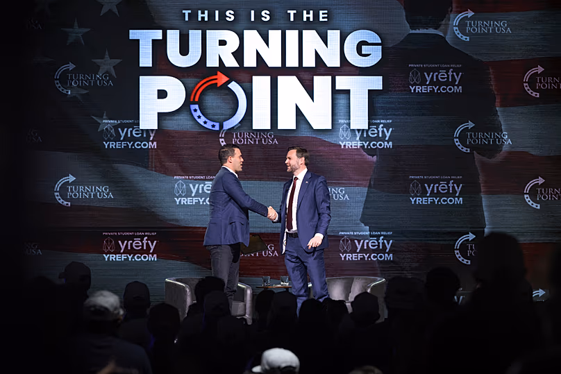 Vice President JD Vance shakes hands with Turning Point USA spokesperson Andrew Kolvet during a Turning Point USA event in Athens, GA, 14 April 2026