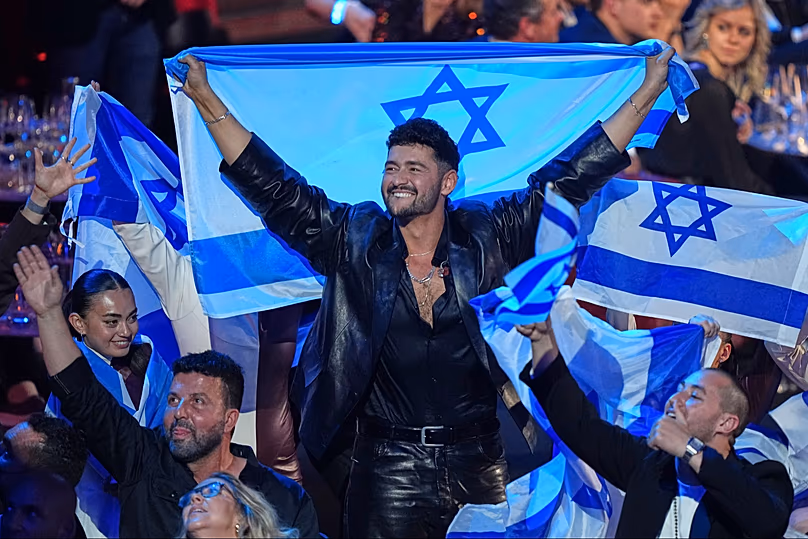 Noam Bettan from Israel, center, reacts as the points are awarded during the Grand Final of the 70th Eurovision Song Contest in Vienna, Austria, Sunday, May 17, 2026