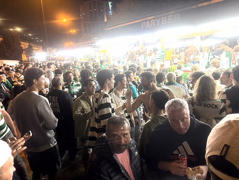 Fans by the food trucks on a match day at Alvalade