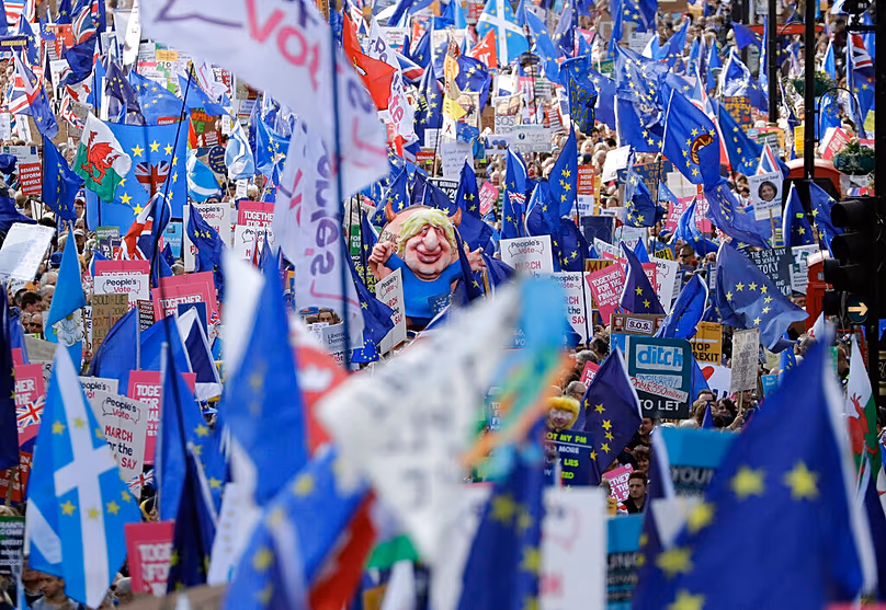 FILE: supporters take part in a 'People's Vote' protest march calling for another referendum on Britain's EU membership, in London, 19 October 2019