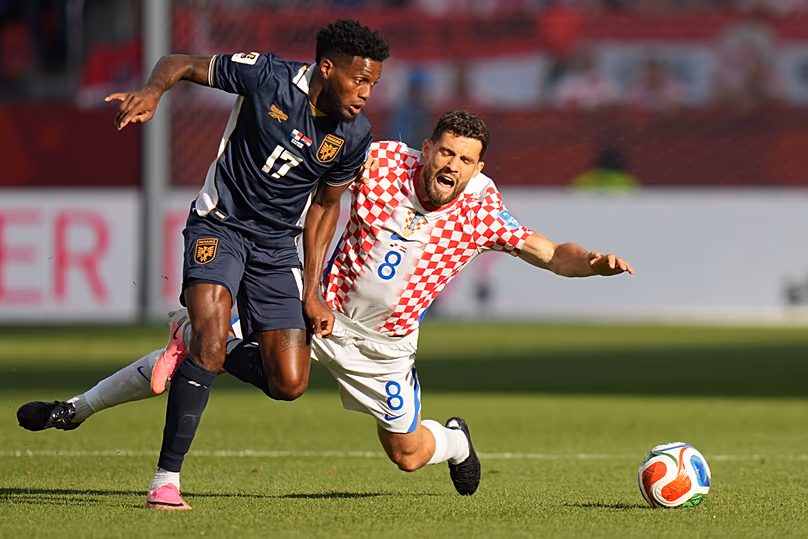 Croatia's Mateo Kovacic and Panama's Jose Fajardo vie for the ball during the World Cup Group L match in Toronto, Tuesday, June 23, 2026