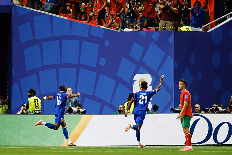 Haiti's Lenny Joseph celebrates after Morocco goalkeeper Yassine Bounou scored an own goal during the World Cup Group C match in Atlanta, Wednesday, June 24, 2026