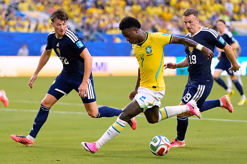 Brazil's Vinicius Junior battles for the ball during the World Cup Group C match against Scotland in Miami Gardens, Florida, Wednesday, June 24, 2026