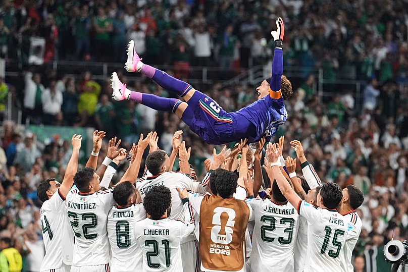 Mexico goalkeeper Guillermo Ochoa celebrates with teammates following the World Cup Group A match against Czechia in Mexico City, Wednesday, June 24, 2026