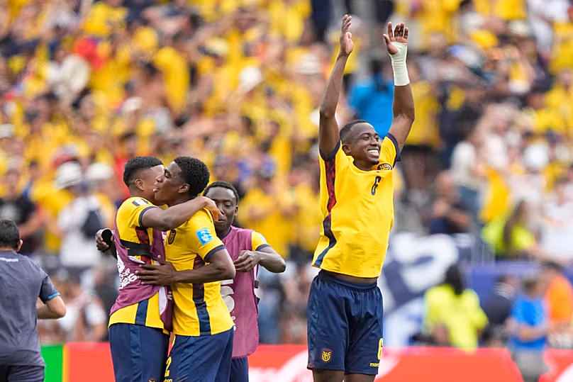 Ecuador players celebrate at the end of the World Cup Group E match against Germany in East Rutherford, NJ, near New York, Thursday, June 25, 2026