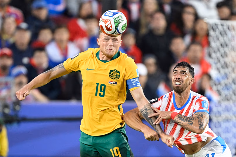 Australia's Harry Souttar battles for the ball with Paraguay's Gabriel Avalos during the World Cup Group D match in Santa Clara, California, Thursday, June 25, 2026