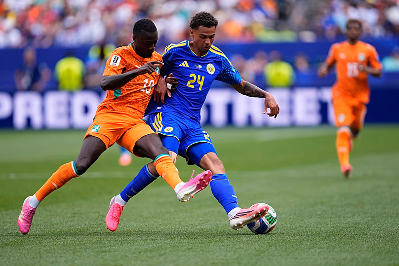 Ivory Coast's Nicolas Pepe and Curaçao's Deveron Fonville fight for the ball during the World Cup Group E match in Philadelphia, Thursday, June 25, 2026