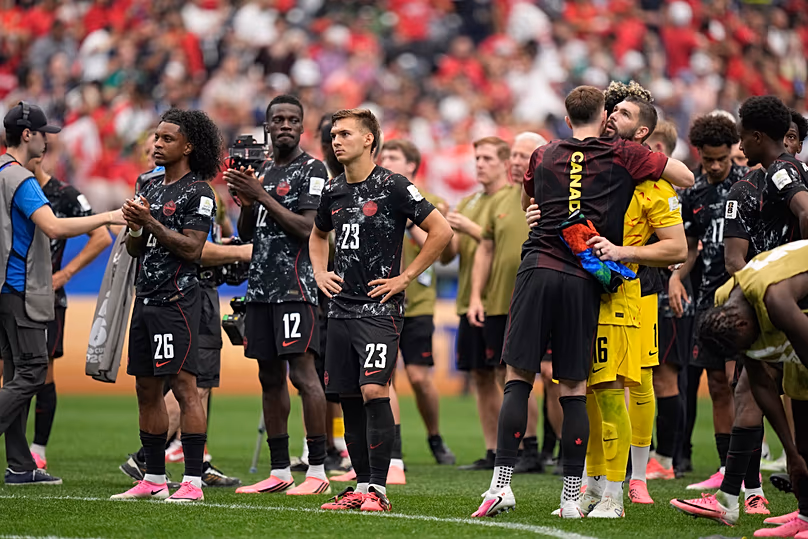 Les joueurs canadiens réagissent après le huitième de finale de la Coupe du monde de football entre le Canada et le Maroc à Houston, le samedi 4 juillet 2026.