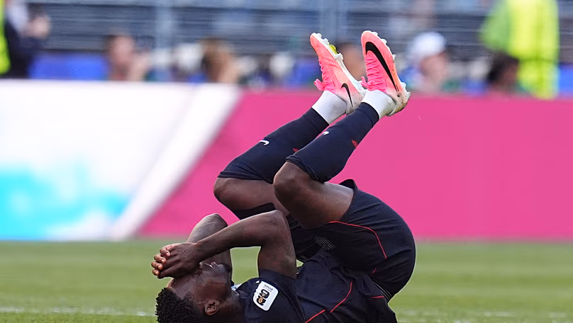 L'Américain Folarin Balogun réagit après le troisième but de la Belgique lors des huitièmes de finale de la Coupe du monde de football à Seattle, le lundi 6 juillet 2026.