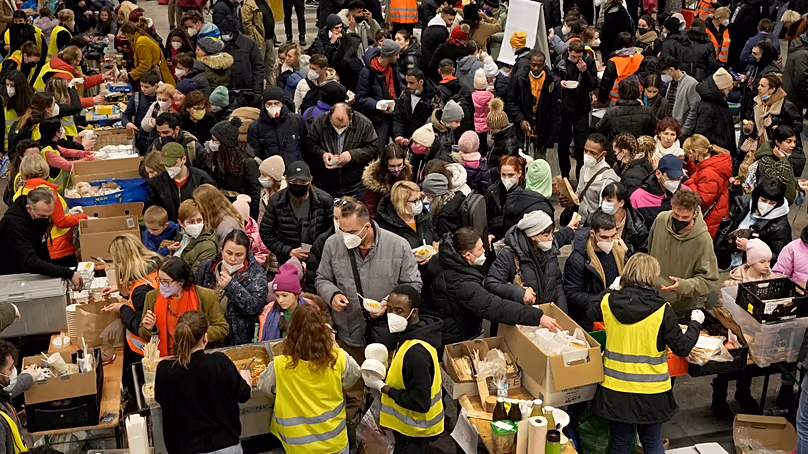 ARCHIVE – Ukrainian refugees stand in the arrivals area at Berlin Central Station after their arrival on 8 March 2022