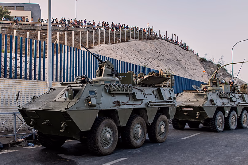 Soldiers from the Spanish army travel in military vehicles after being deployed in the Spanish enclave of Ceuta, Thursday 30 July 2026.