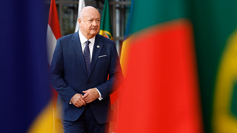 Le chancelier autrichien Christian Stocker arrive au bâtiment du Conseil européen à Bruxelles, le 19 mars 2026.
